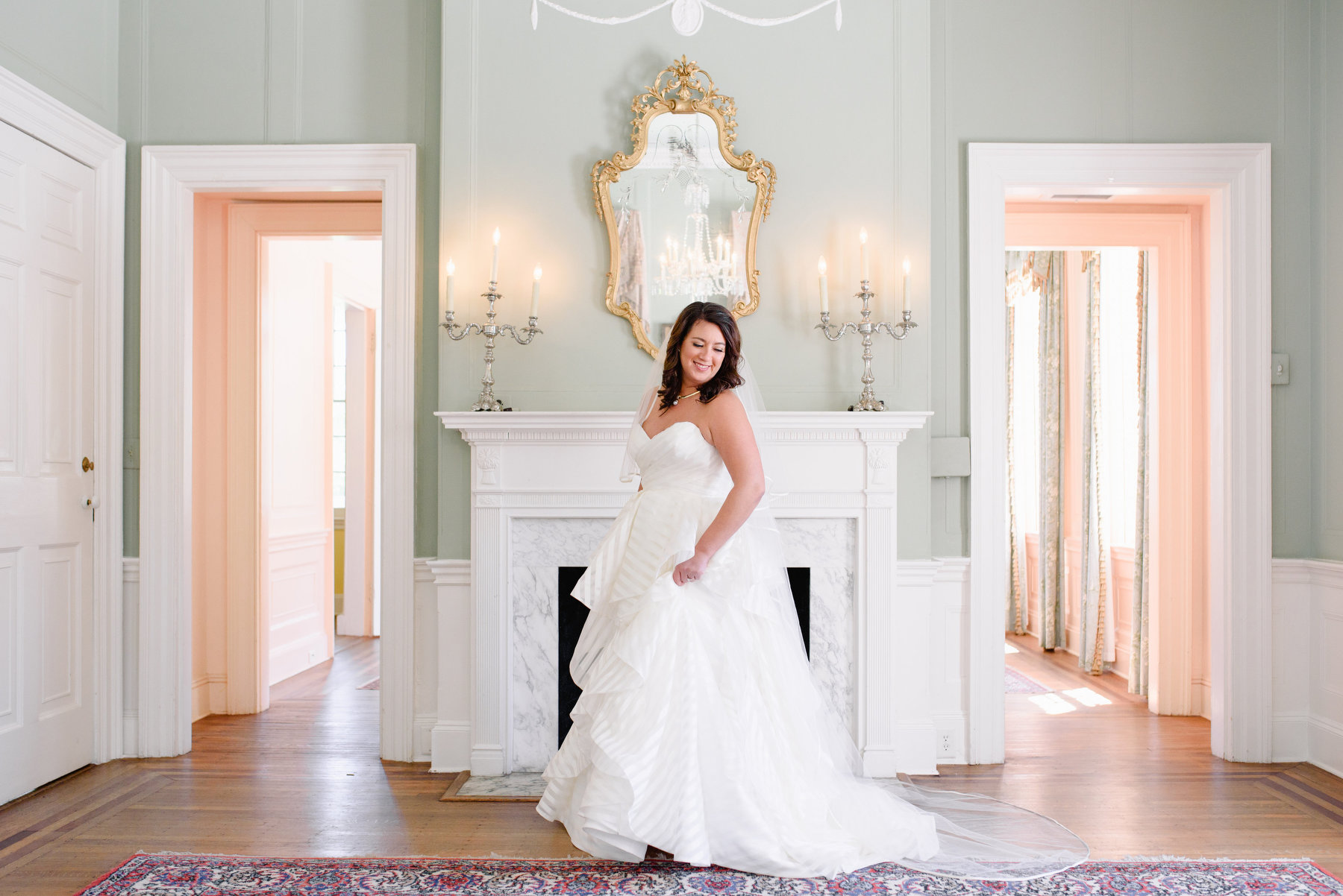 A bride poses during her summer Lowndes Grove bridal photos session in Charleston, SC.